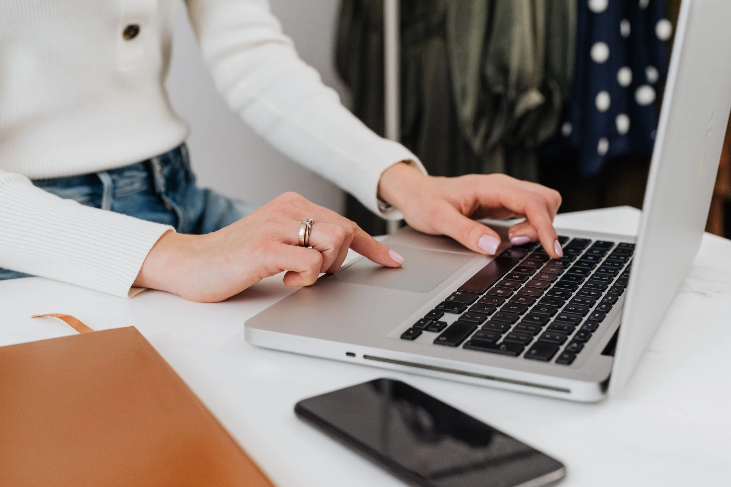 outsource email marketing female founder at laptop