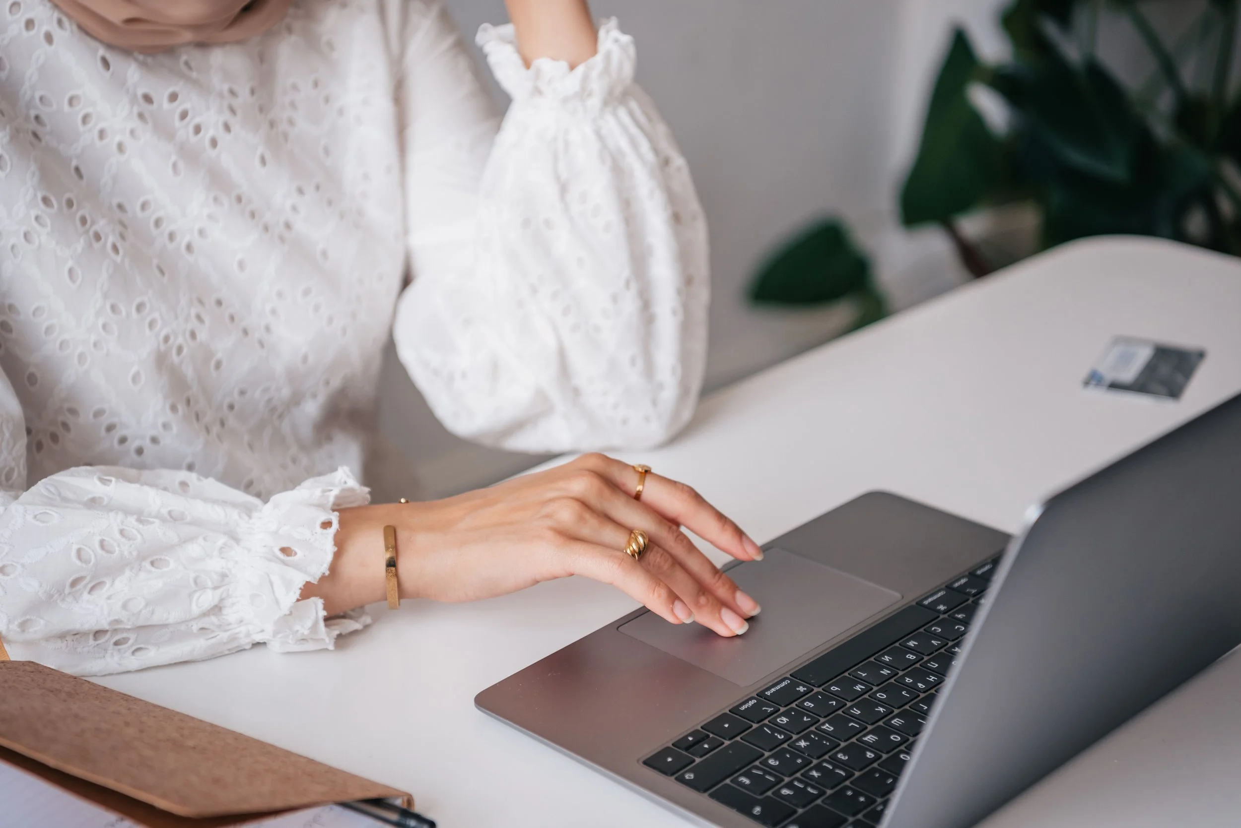 female founder ready to outsource email marketing at laptop