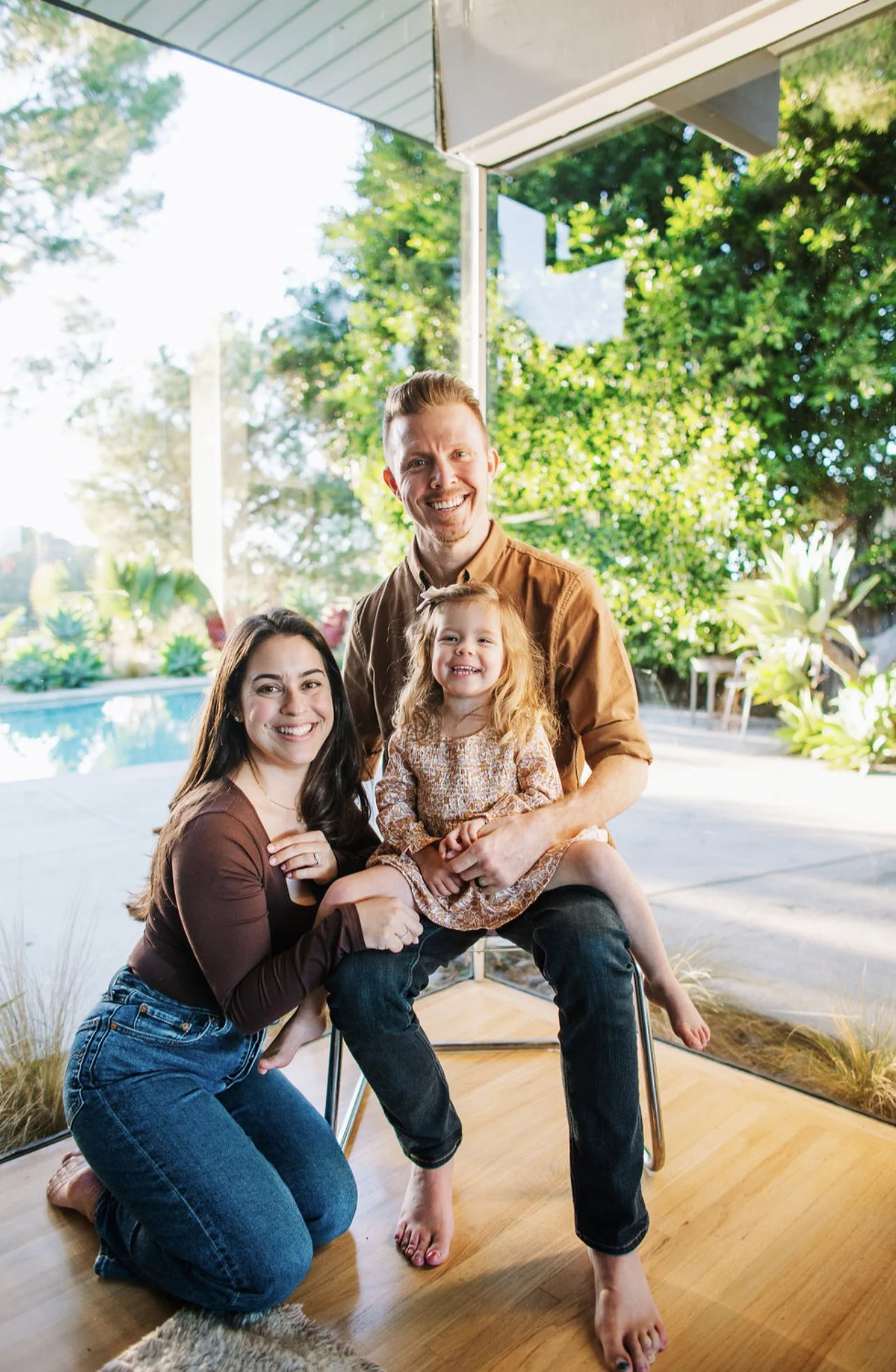 Aaron Baker and his wife, Katie Baker holding their daughter, Cayla.