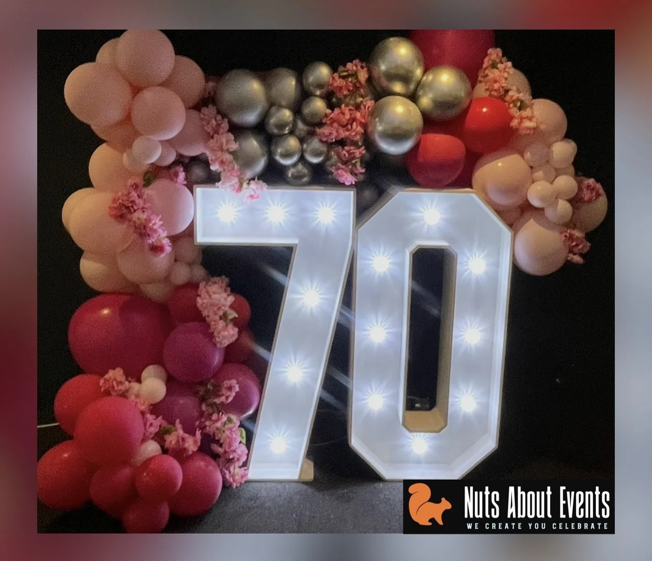 Light Up 70 with Flowers.jpeg