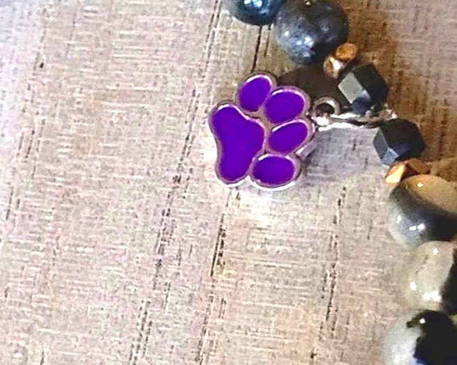 Tourmalinated Moonstone & Labradorite. Small Hematite stone spacers & rose gold plated donut spacers. Red, Green, & Purple Enamel Puppy Paw Charms