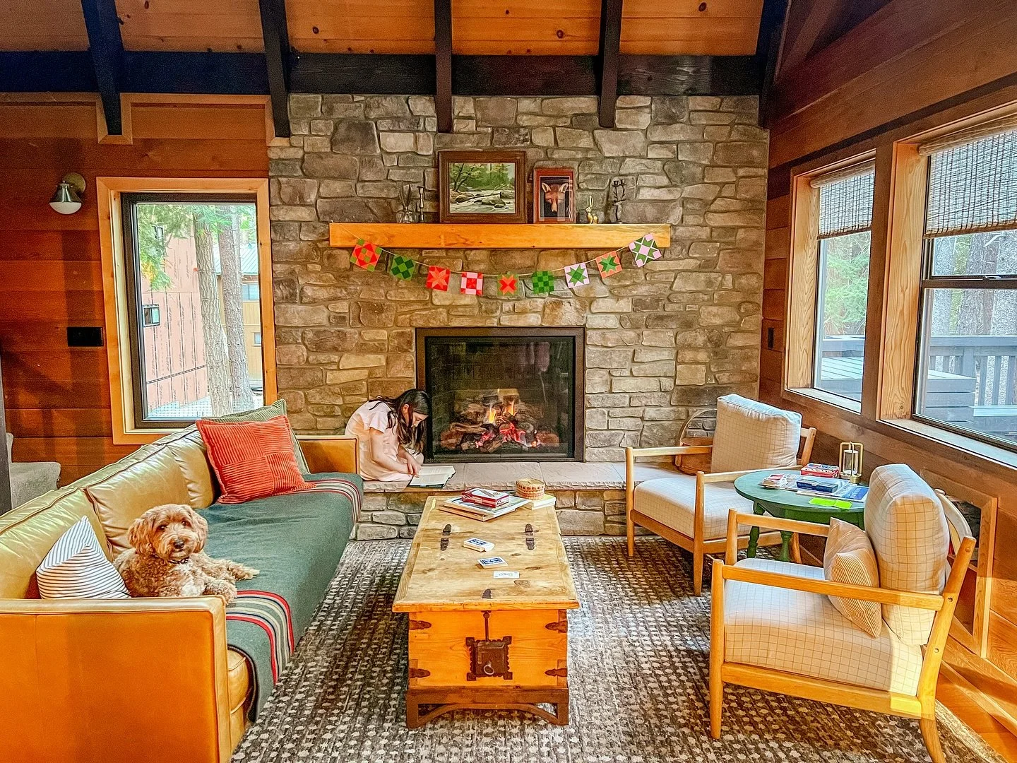 💫 The cabin fireplace got its glow-up &mdash; just in time for cozy nights and slow mornings. Scroll to see what it looked like before! Now the floor is wood (not carpet), the rocks are smooth and gray like what you&rsquo;ll see in the forest outsid