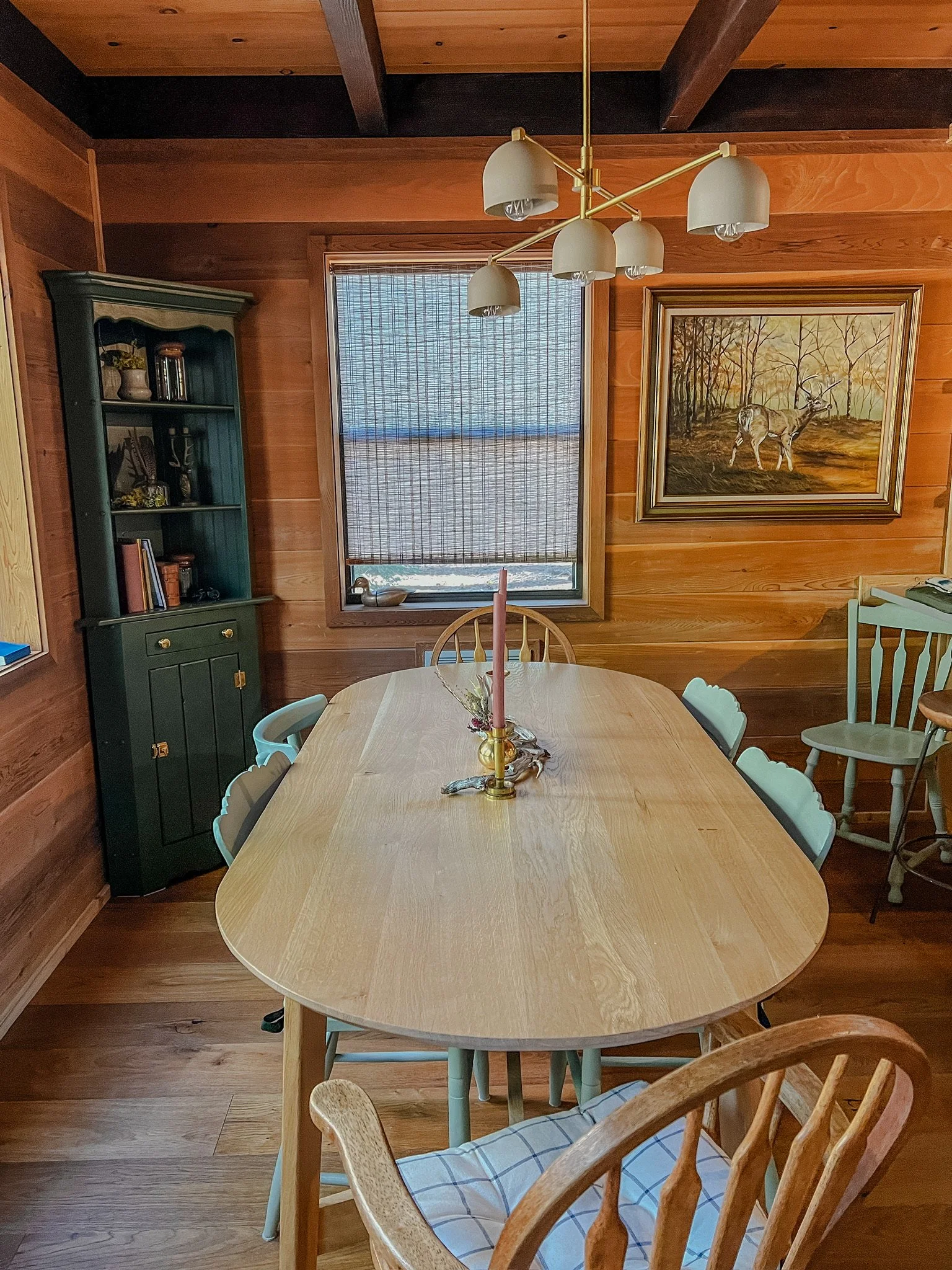 Cabin dining room, seats 6 at this table and 4 kids at the counter. 
