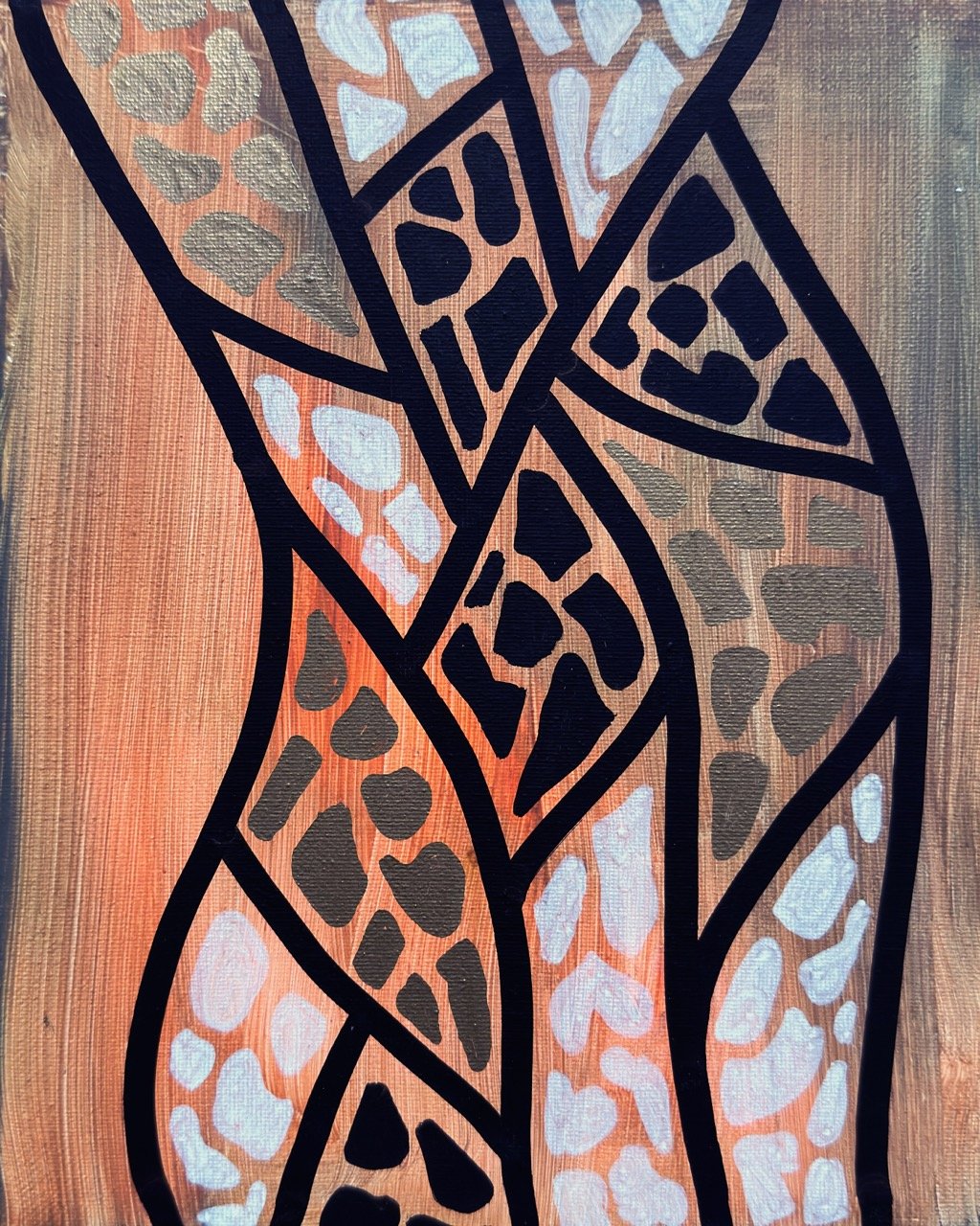 Abstract painting of giraffe spots with black outlines on a textured wooden background.