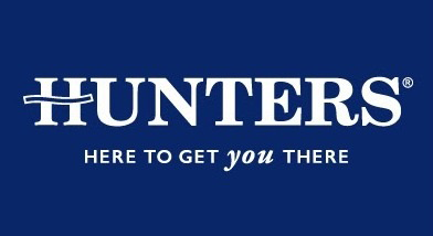 HUNTERS logo with the slogan 'Here to get you there' on a dark blue background.