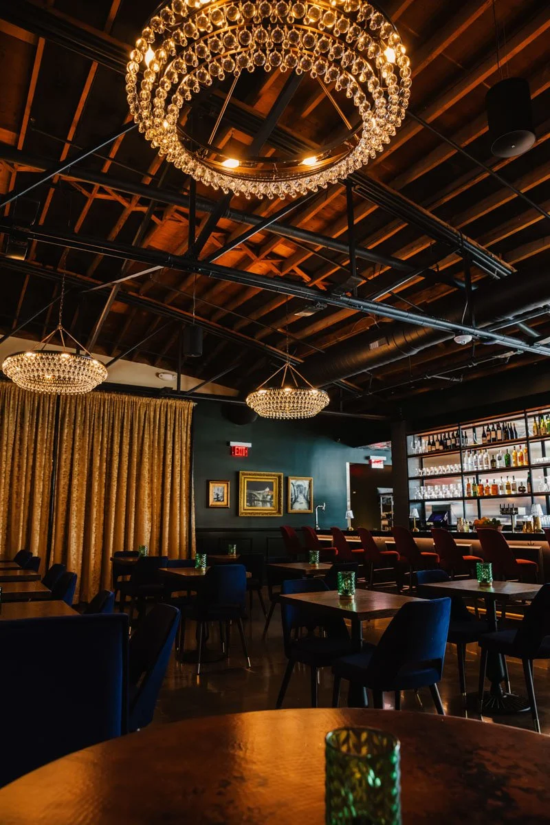 beautiful intimate main dining room part of wine bar available for hosting private events such as corporate, birthday, anniversary, bridal shower, wedding party, including full restaurant buyout in charlotte elizabeth neighborhood north carolina