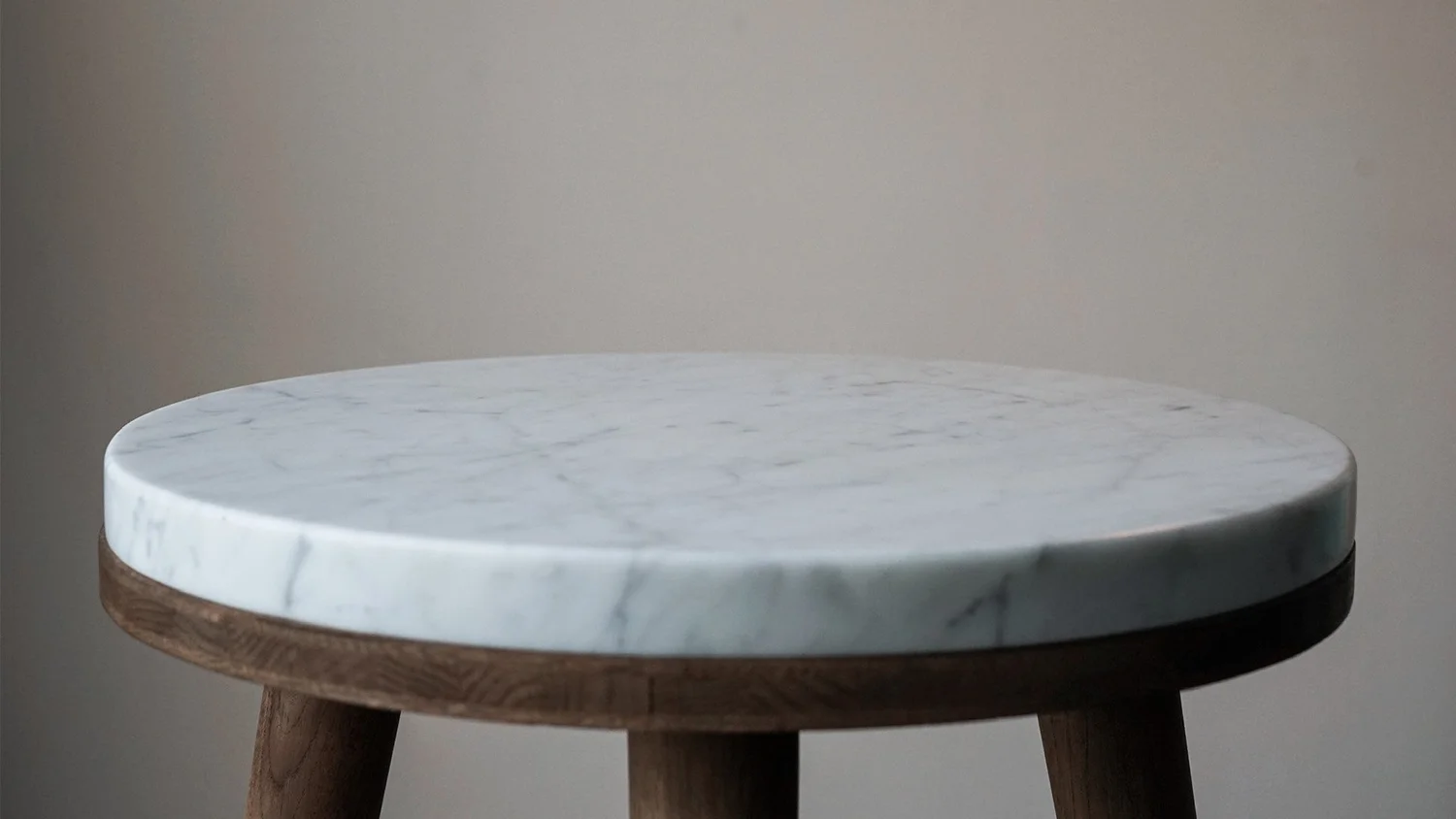 Carrara Table — Carrara marble and steel dining table, made by JHA Studio