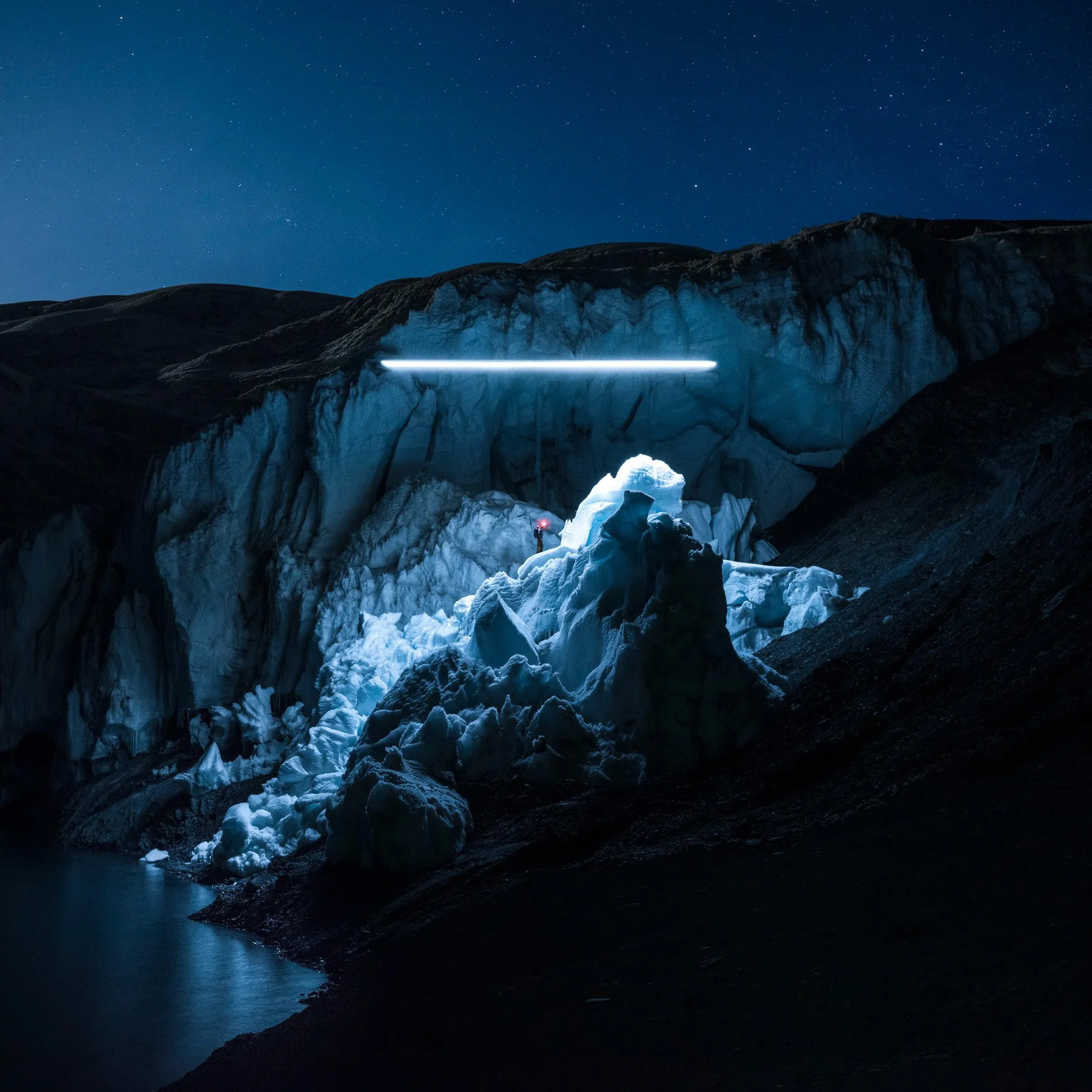 Nocturnal landscape image emphasizing contrast between darkness and illuminated form
