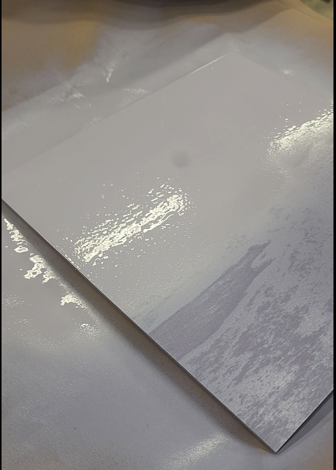 Name Sign - painting name sign lilac spray paint.png