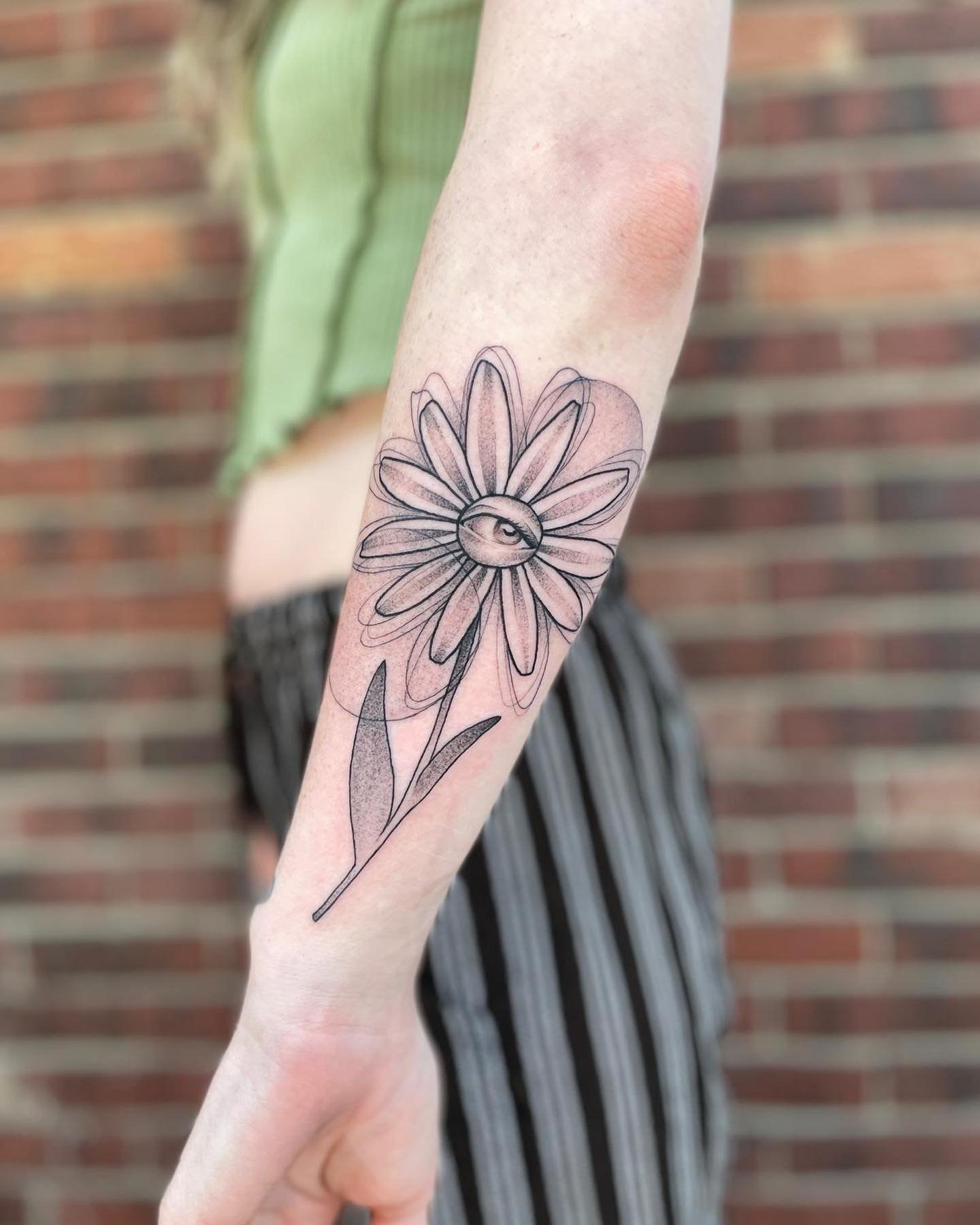EYE love how this tattoo came out! @thebortex makes some of the most unique flash, follow her to make sure you don&rsquo;t miss out on her next flash drop 👁🌼✨

🌙 Made with love @glassmoontattoo
🖤 Made by @meg.n.tattoos 
(Keep an eye for updates o