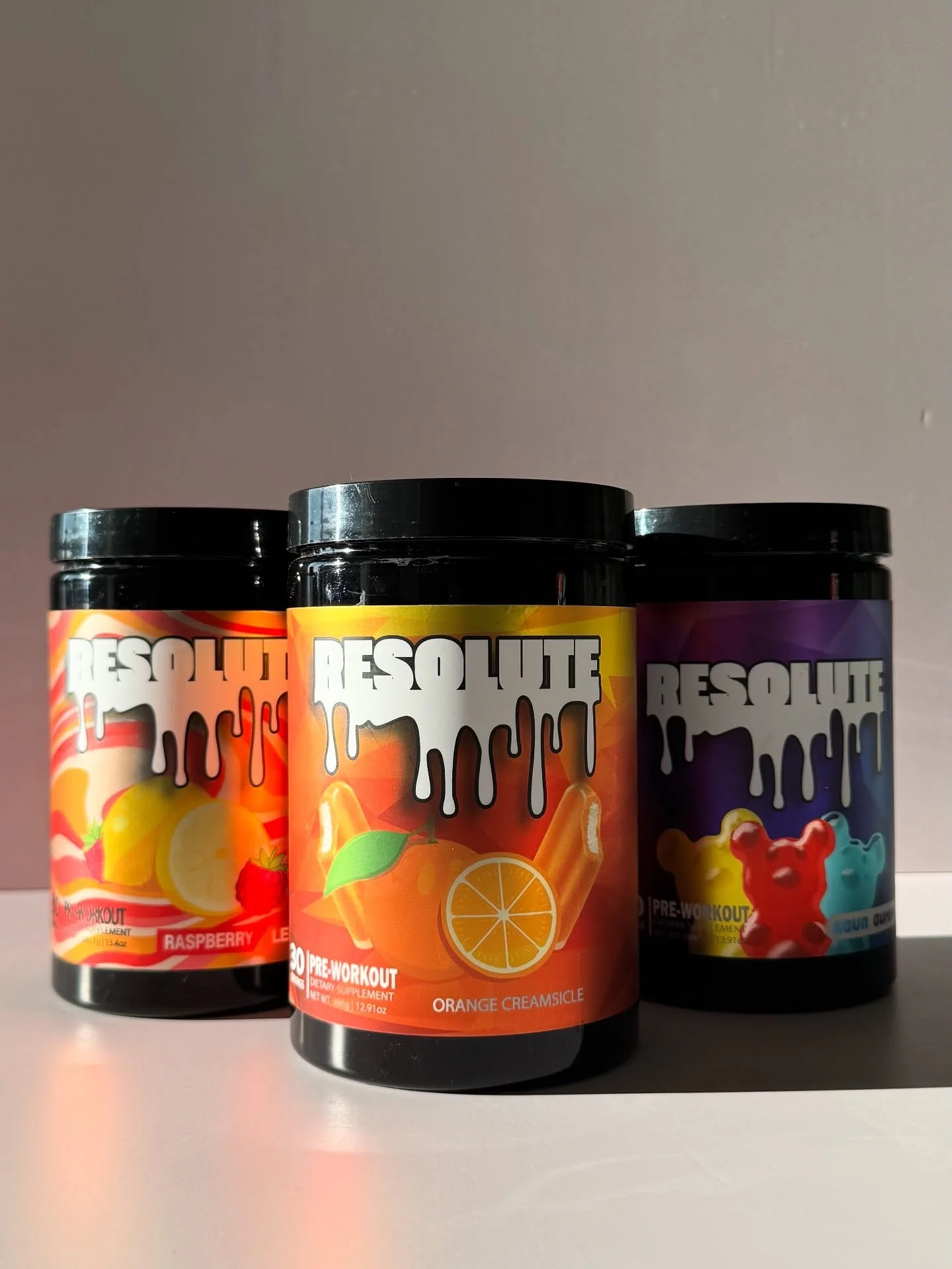 3 flavors. Same energy. Which one are you grabbing today? 🍋✨🍊 

#preworkout #sportssupplements #supplementsthatwork #raspberrylemonade #orangecreamsicle #sourgummy #fitnesslifestyle