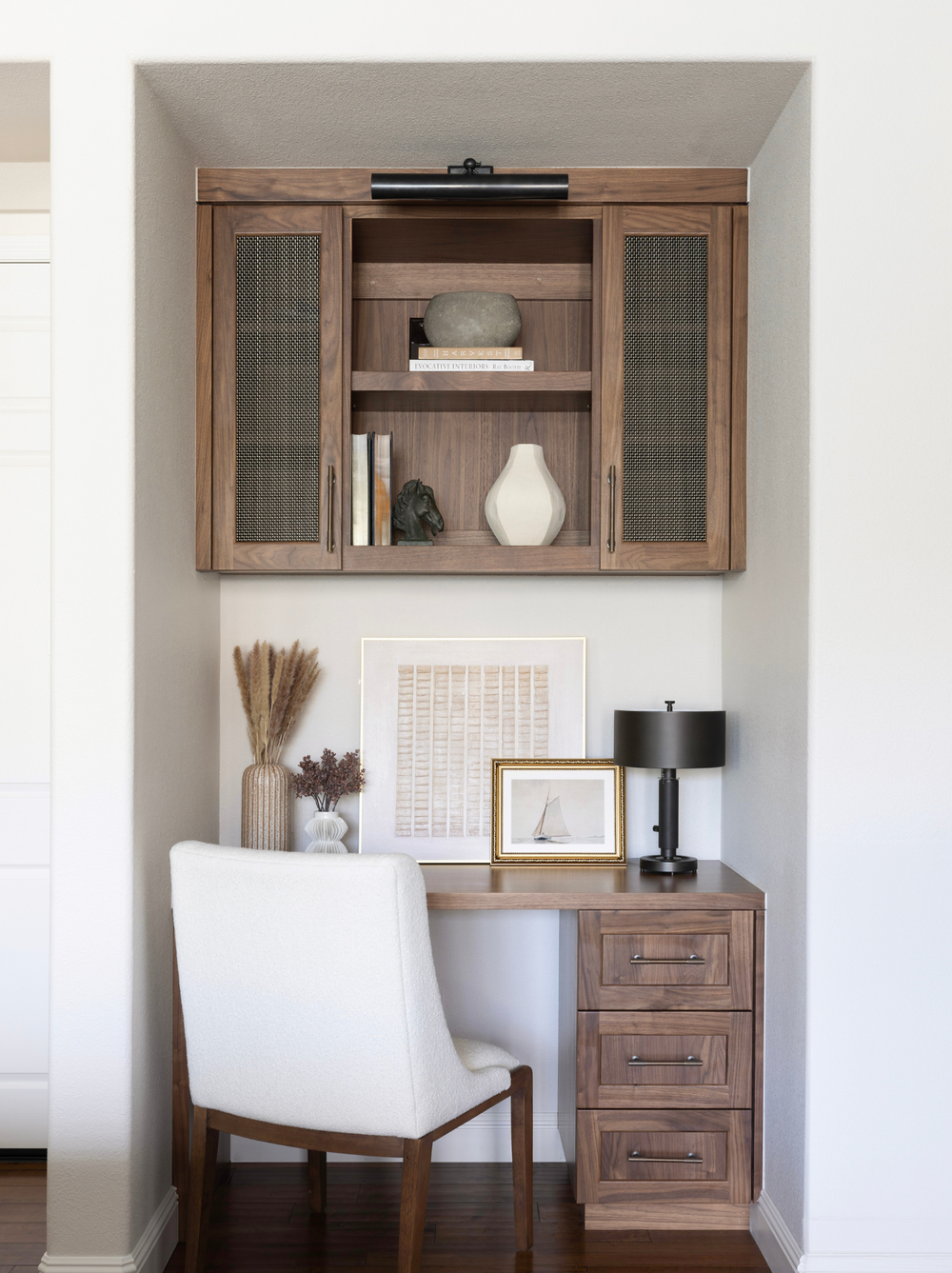 Custom home office nook with built-in desk and cabinetry