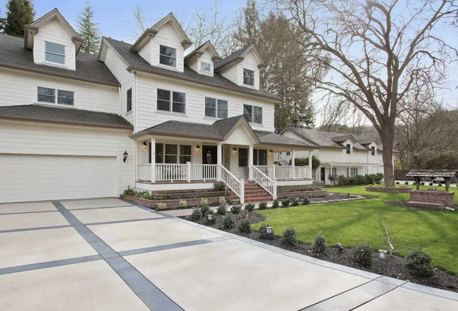 Custom home with French doors, a window nook, and a private balcony