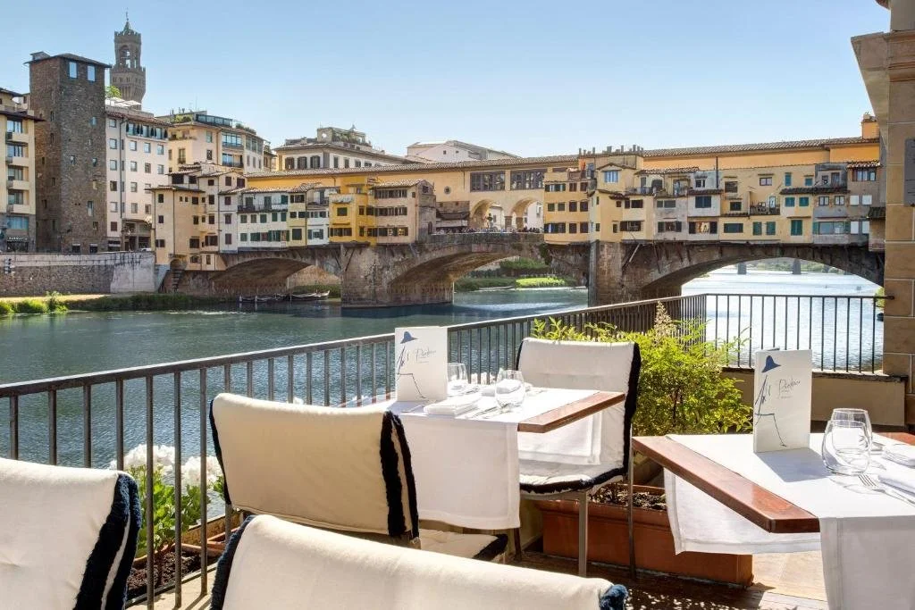 patio overlooking the ponte vecchio at hotel lungarno
