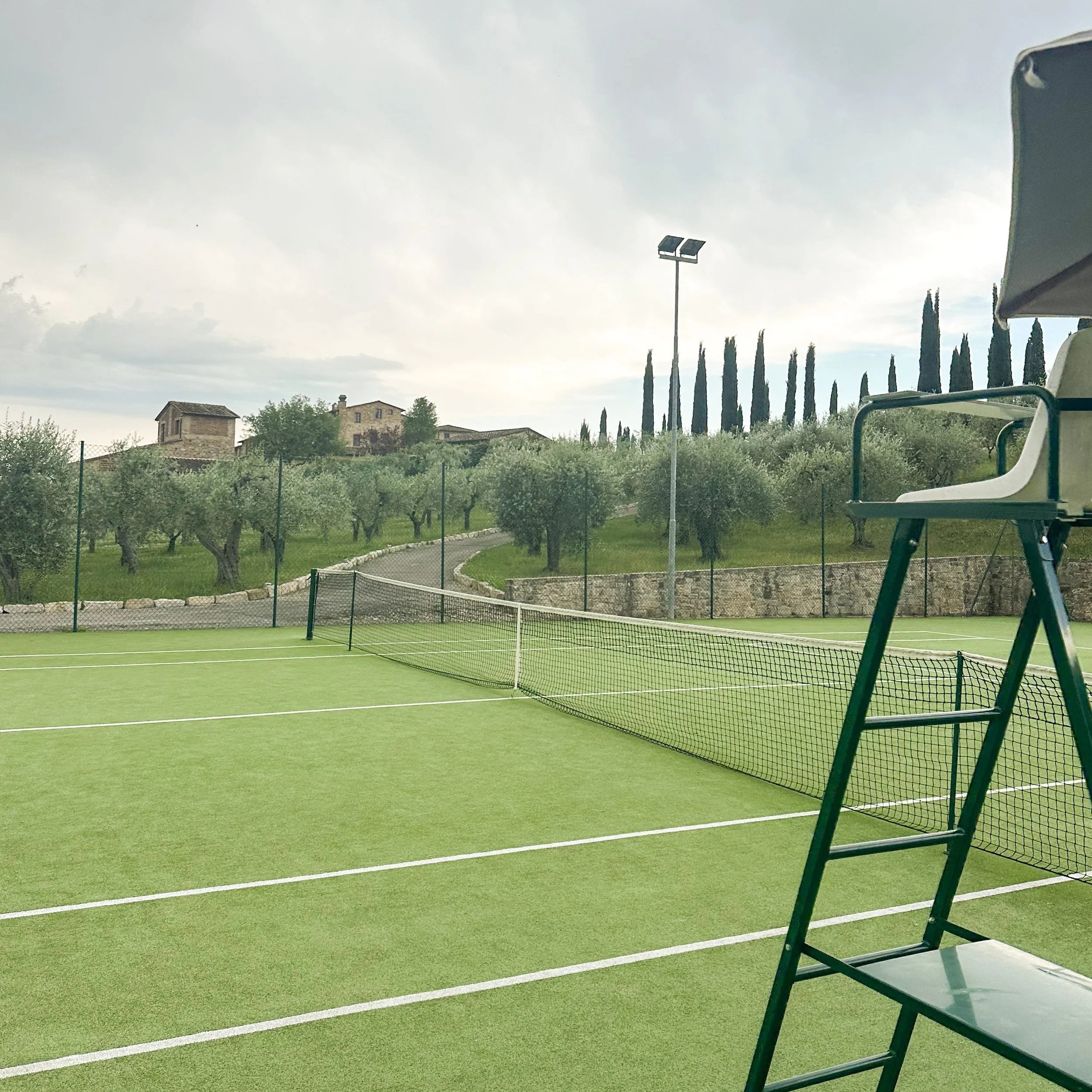 tennis courts at the club house at le fontanelle in tuscany italy