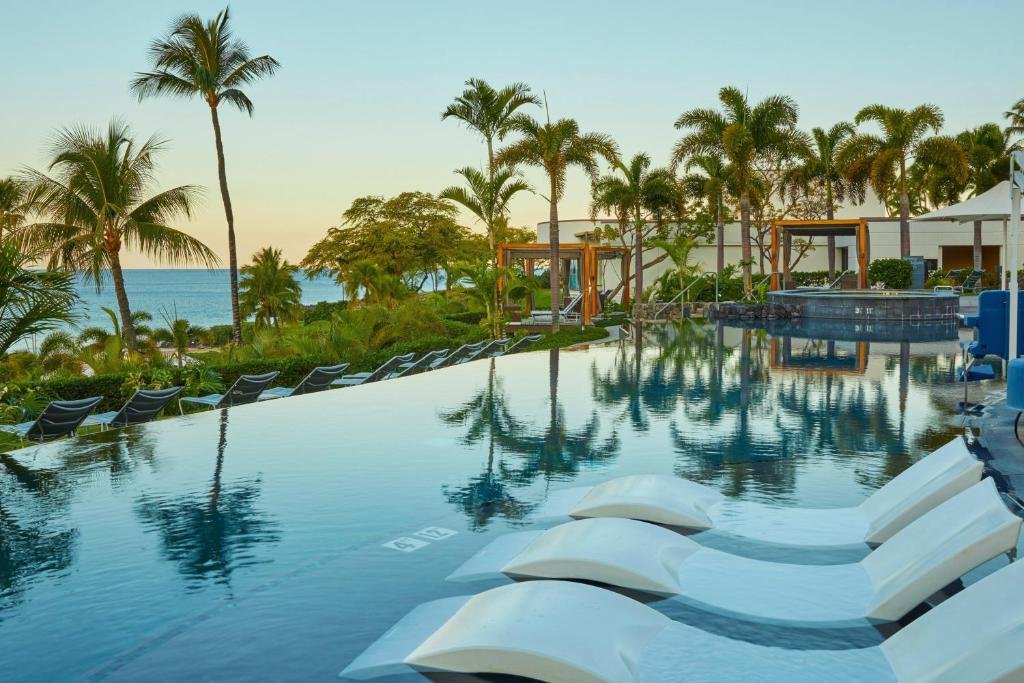 pool loungers at westin hapuna beach resort in big island hawaii