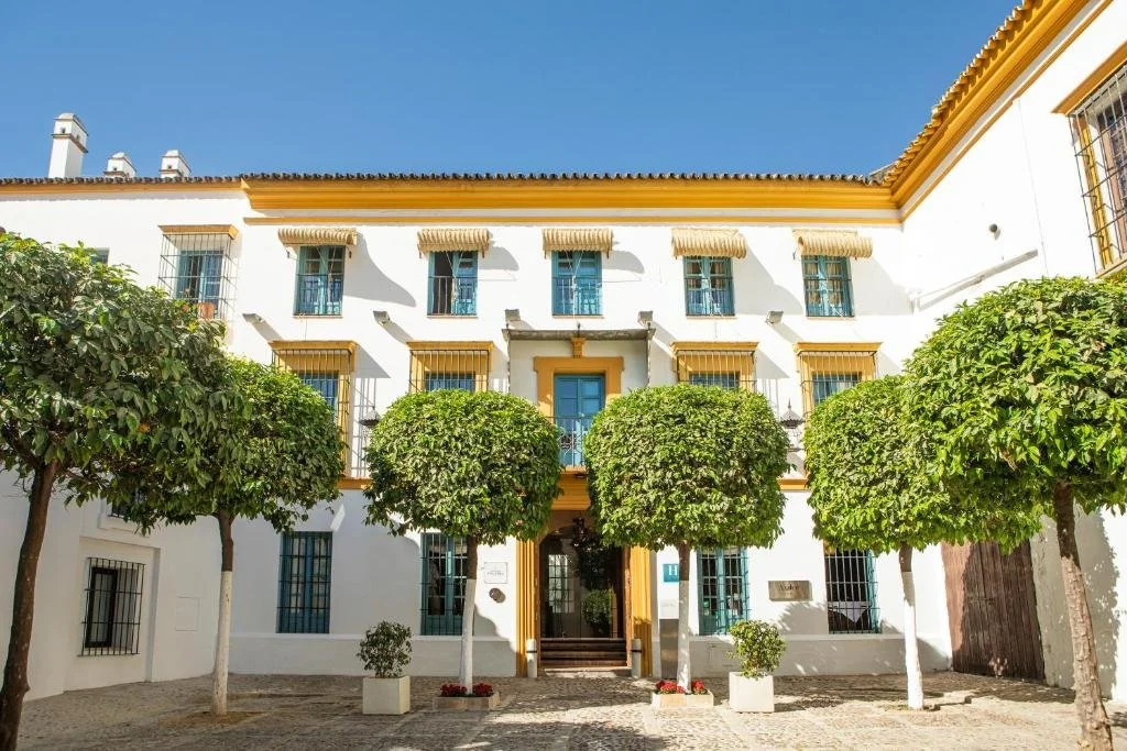exterior and entrance to hospes las casas del rey de baeza in sevilla spain