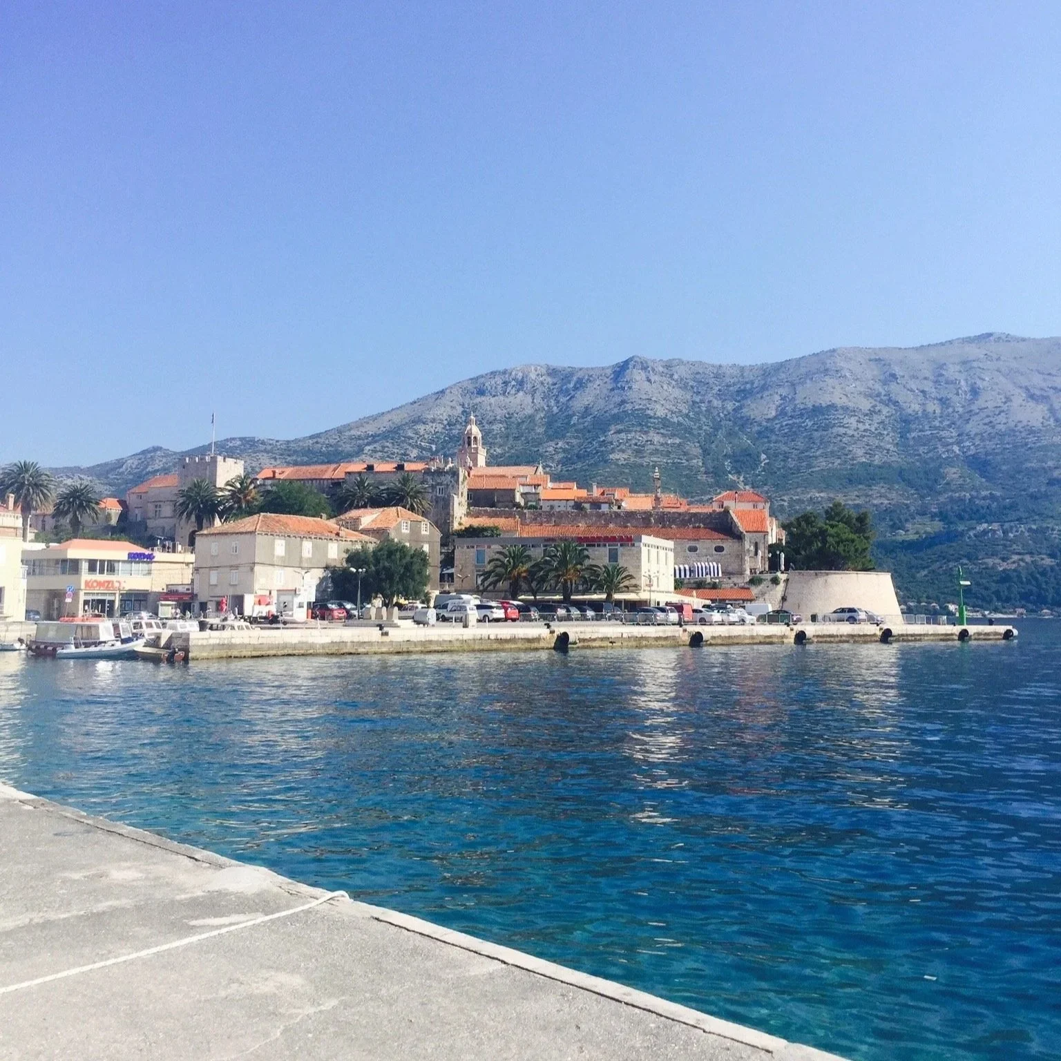 view of korcula old town from the harbor