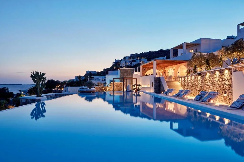 Katikies Mykonos pool at dusk in Mykonos Greece