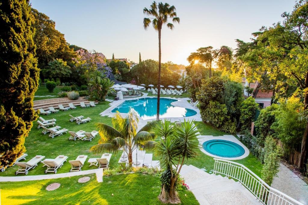 gardens and pool at olissippo lapa palace in Lisbon Portugal