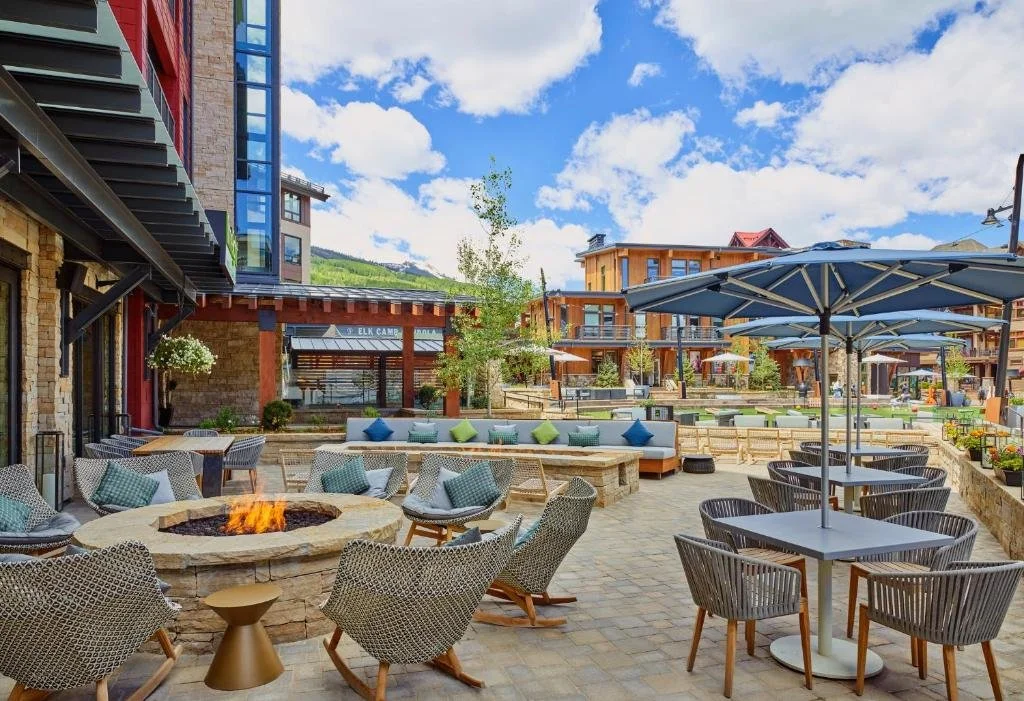limelight snowmass firepits overlooking the skating rink in snowmass village, colorado