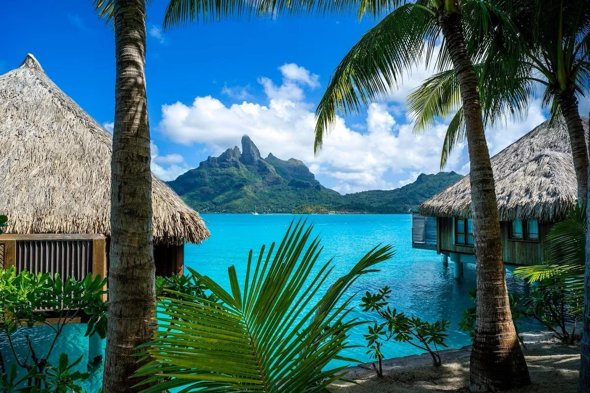 view of lagoon and overwater bungalows at st. regis bora bora in french polynesia