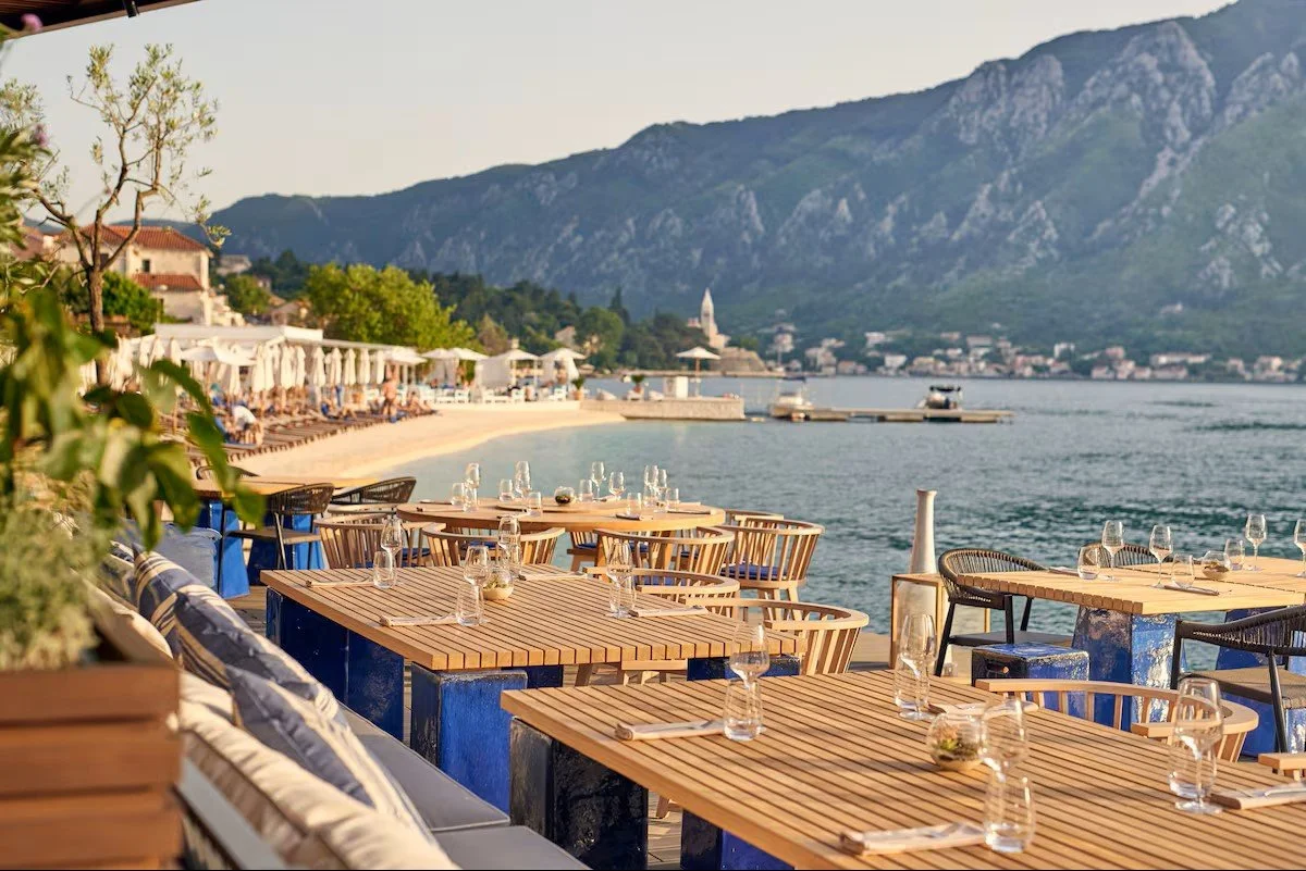 dining area overlooking kotor at huma kotor bay hotel and villas in montenegro