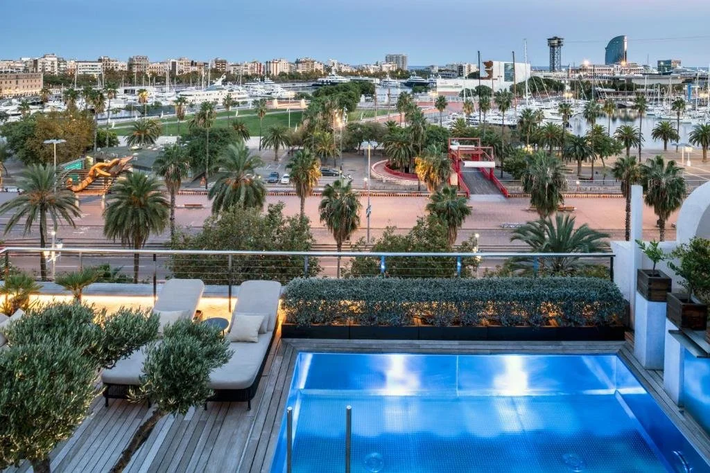 pool overlooking the barcelona skyline at serras hotel in barcelona