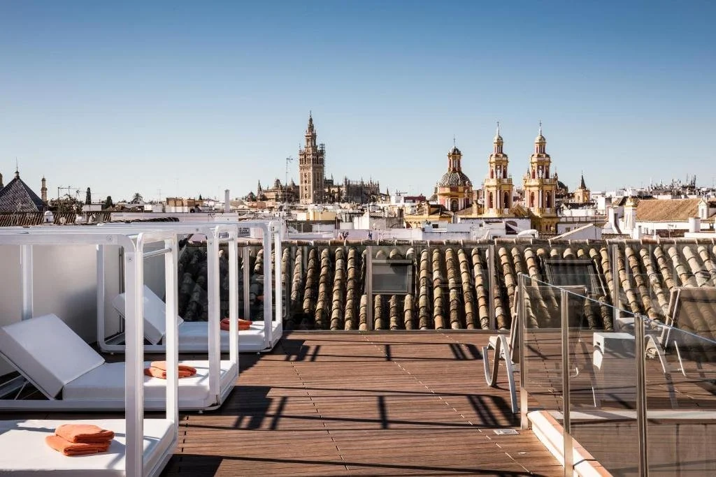 rooftop overlooking sevilla spain at coolrooms palacio de villapanes