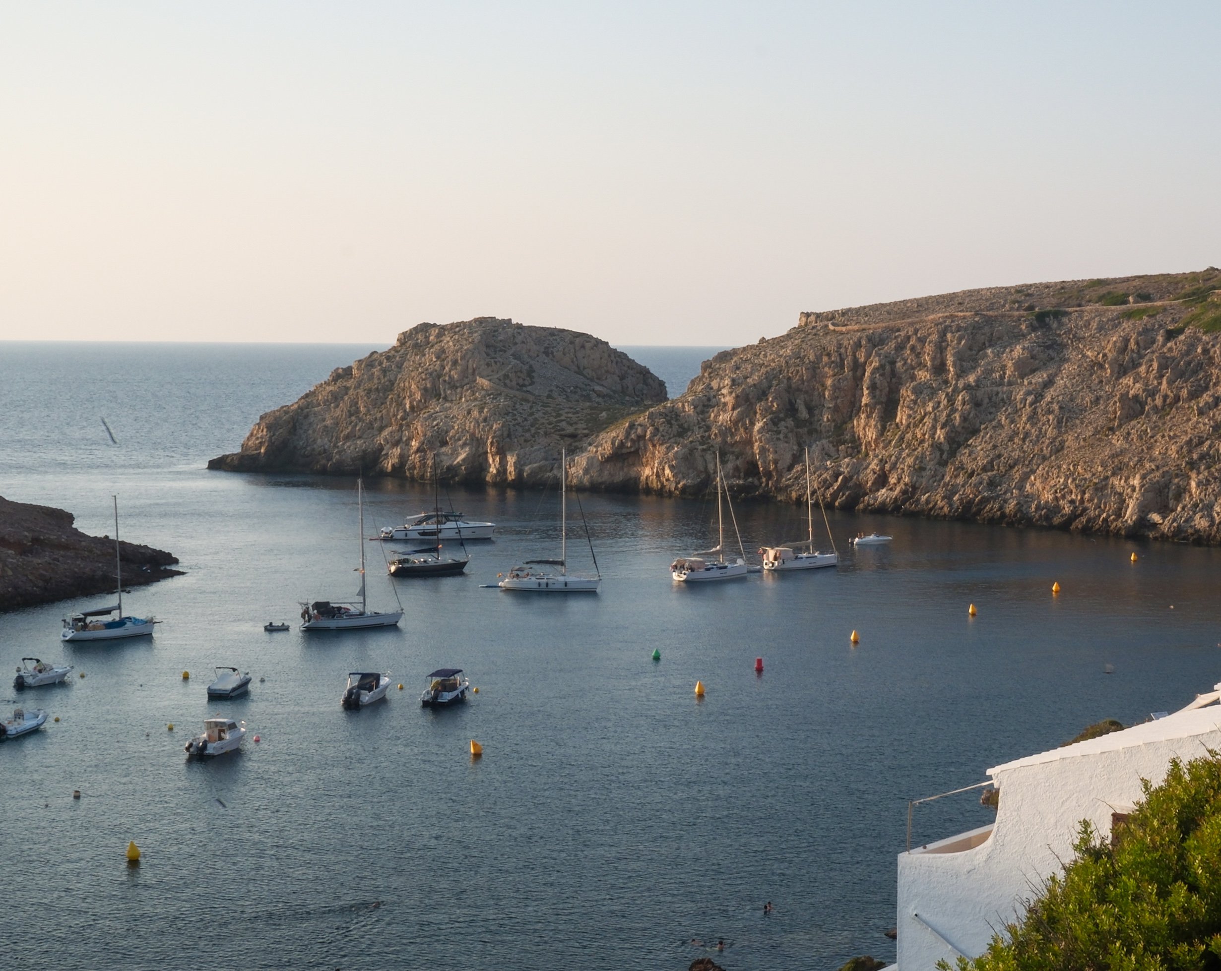ivette beach club overlooking cala morels in menorca spain