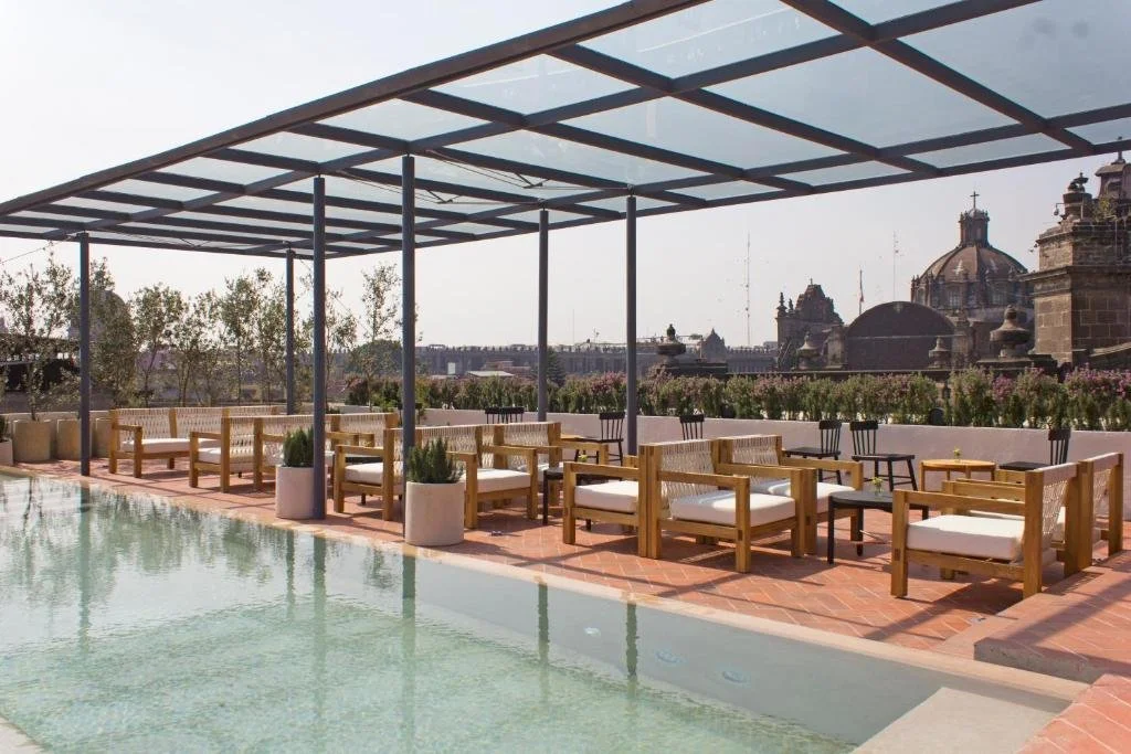 pool overlooking cathedral at circulo mexicano in mexico city