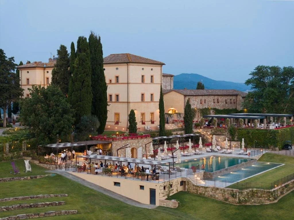 pool area at castello di casole in tuscany italy