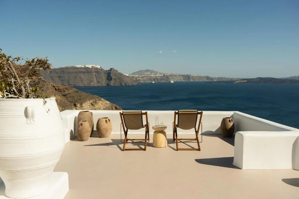 Canaves Ena patio overlooking the Caldera in Santorini Greece