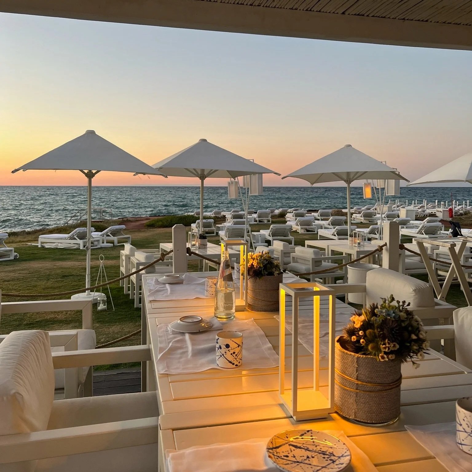 cala masciola beach club at dusk