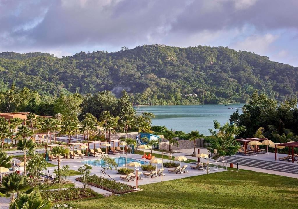 pool overlooking the beach at canopy by hilton in seychelles