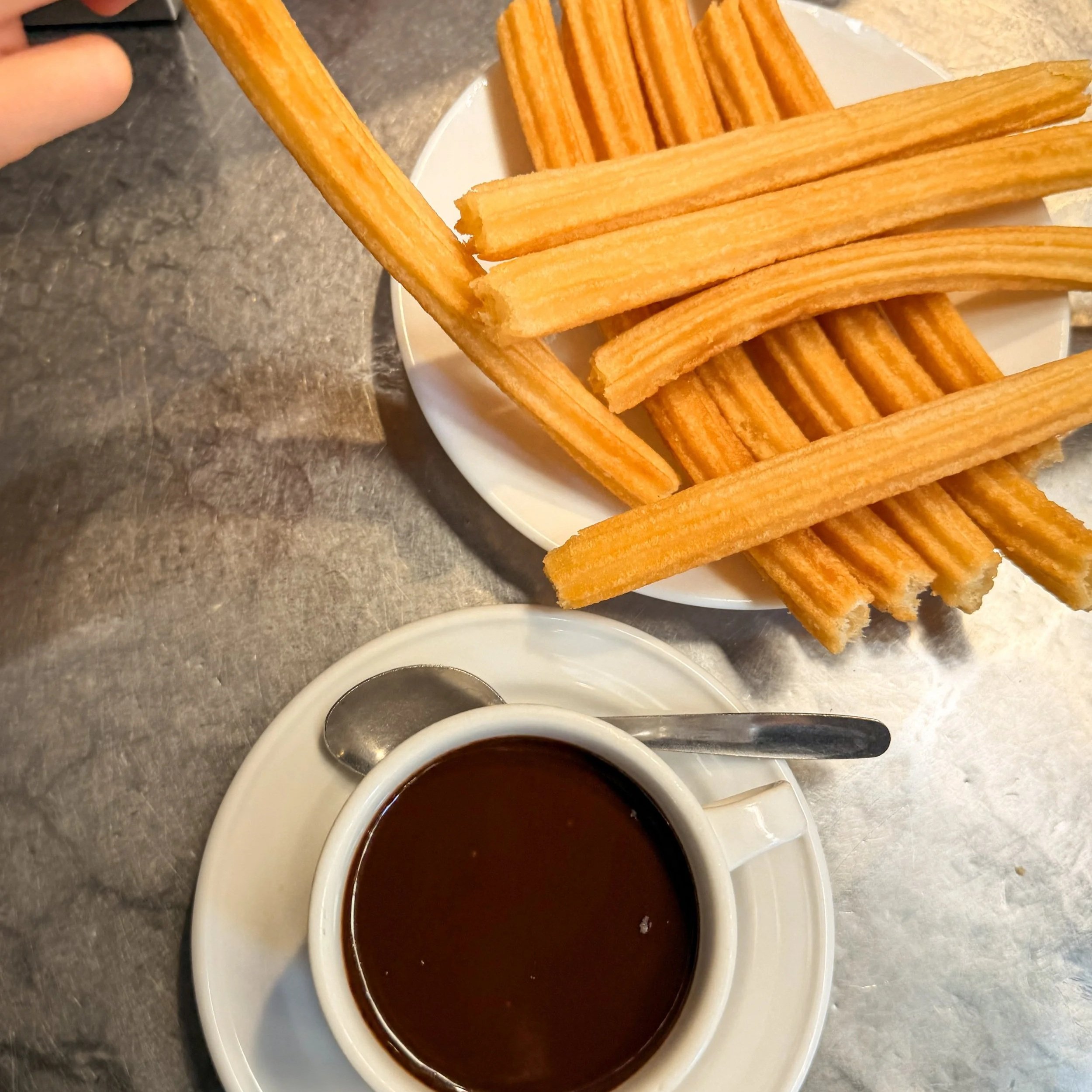 churros y chocolate at san gines in madrid spain