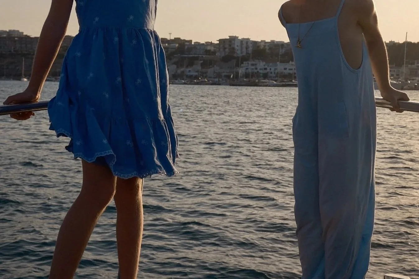 kids on a boat outside Mahon Menorca