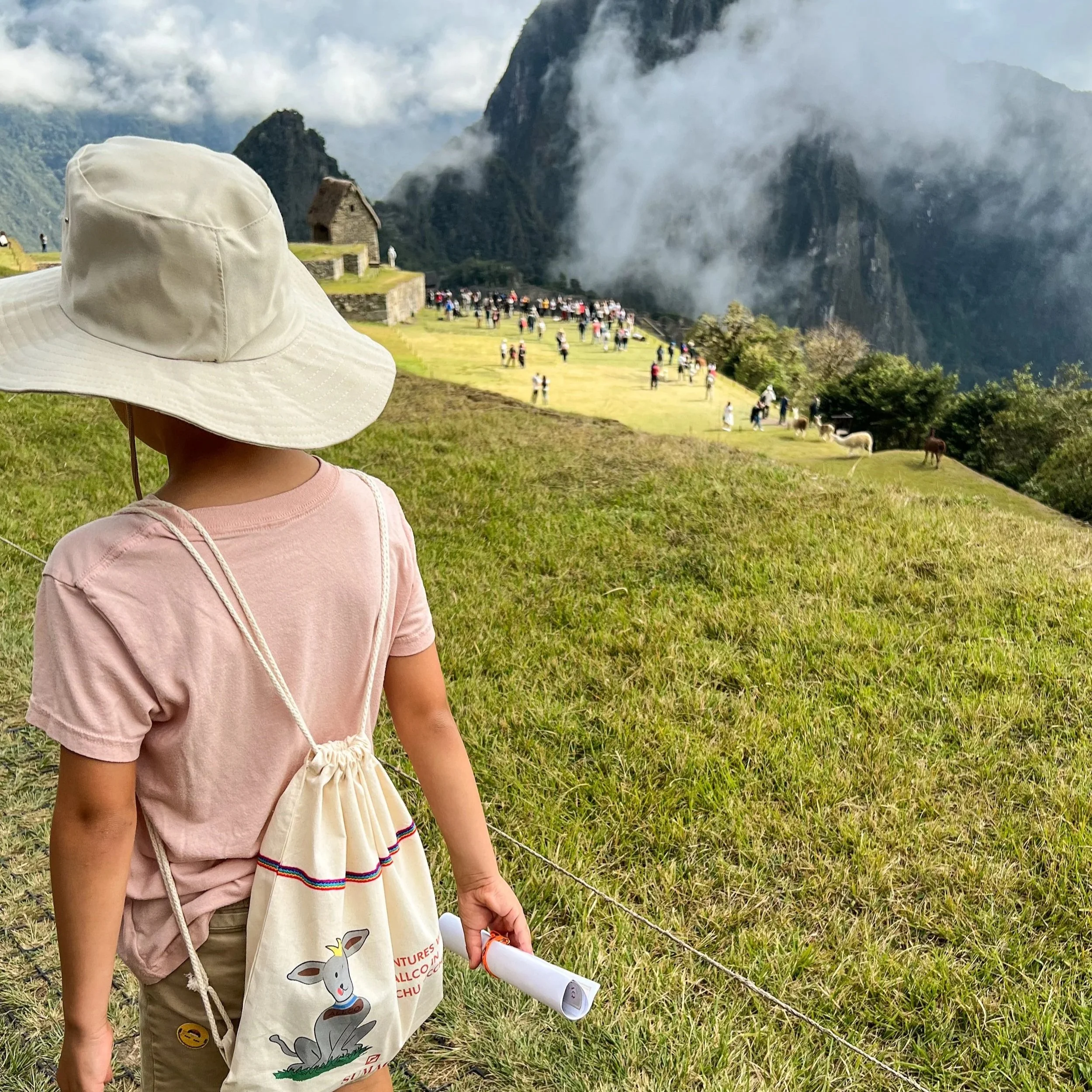 kids exploring maccu picchu in Peru