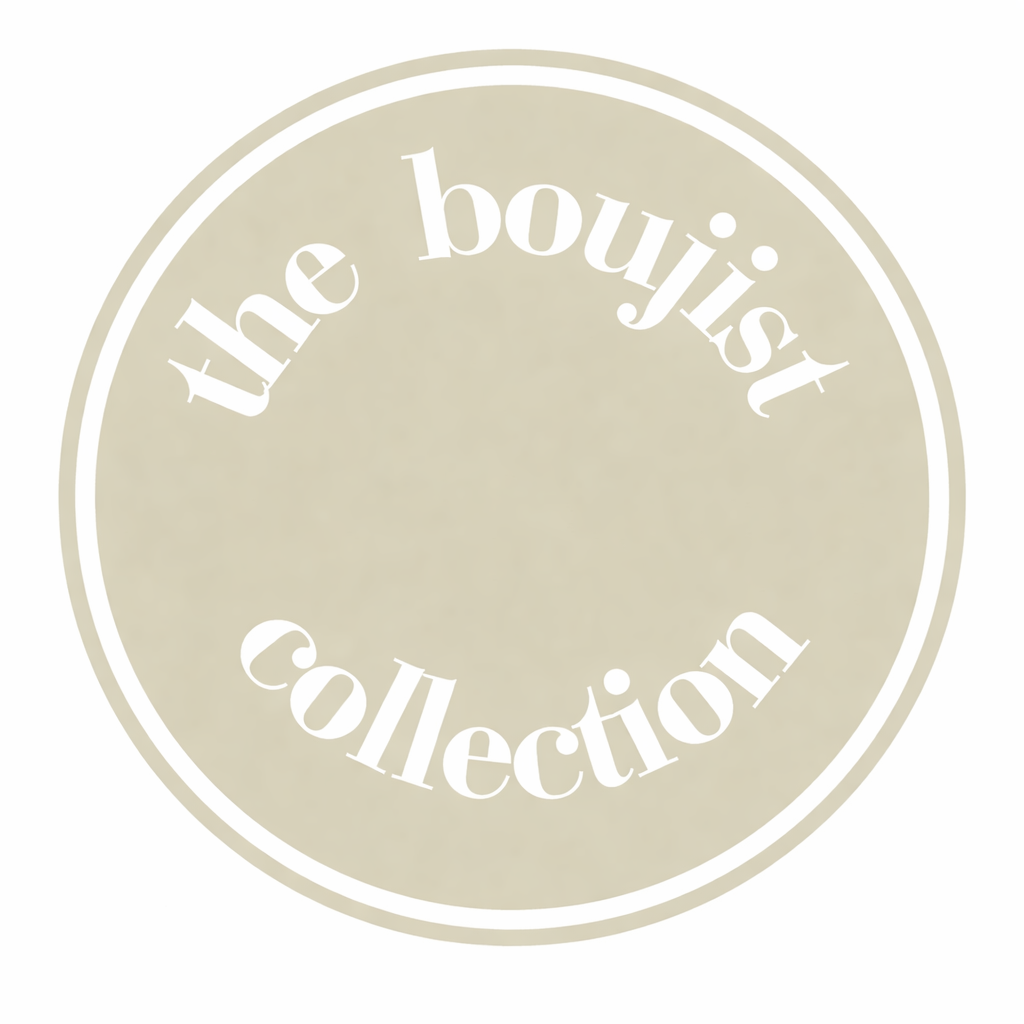 A circular logo with the text "the busy collection" arranged in a circle on a beige background.