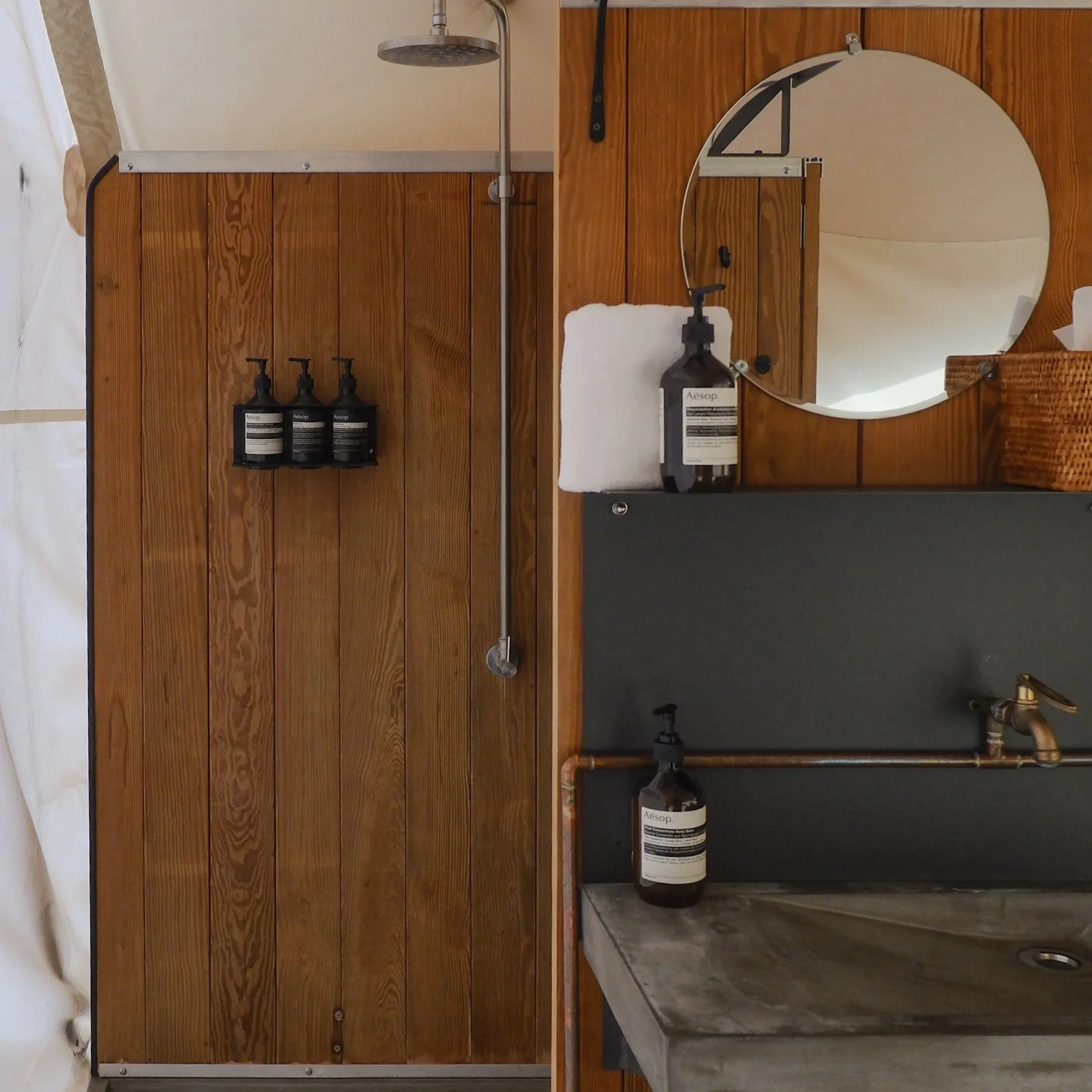 tent bathroom at ulum moab in utah with aesop products