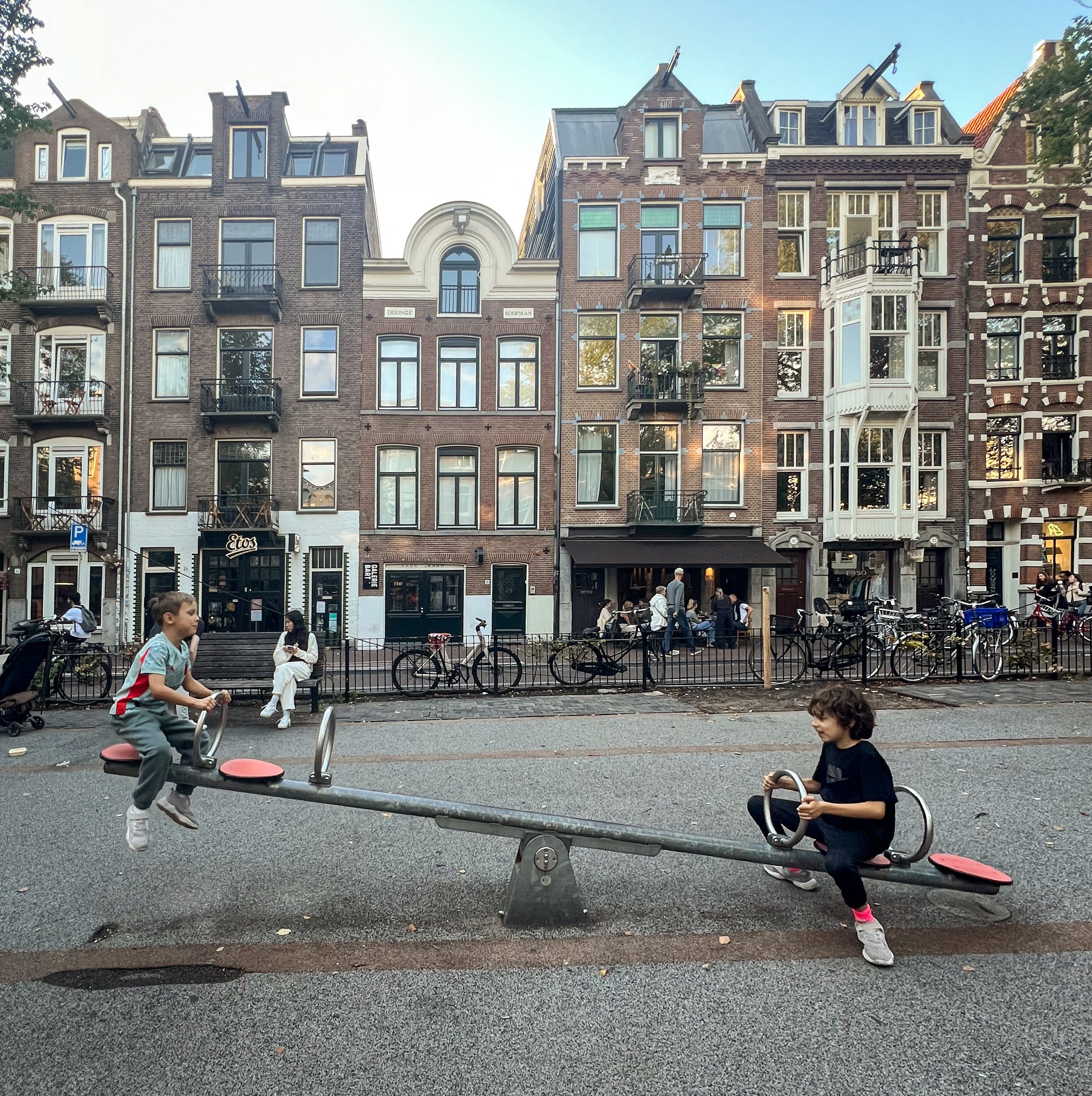 kids on a see saw in amsterdam