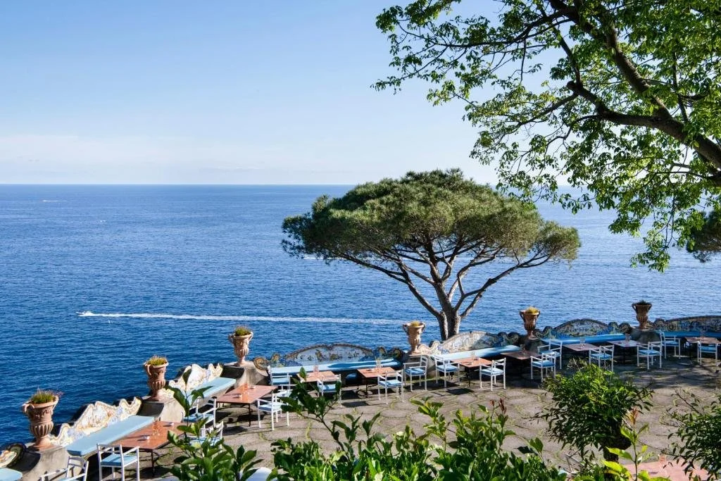 dining area overlooking amalfi coast at il san pietro di positano in italy