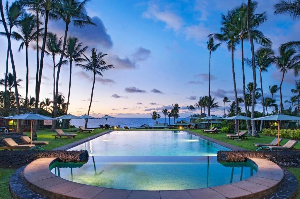 pool at sunset at hana-maui resort in maui hawaii