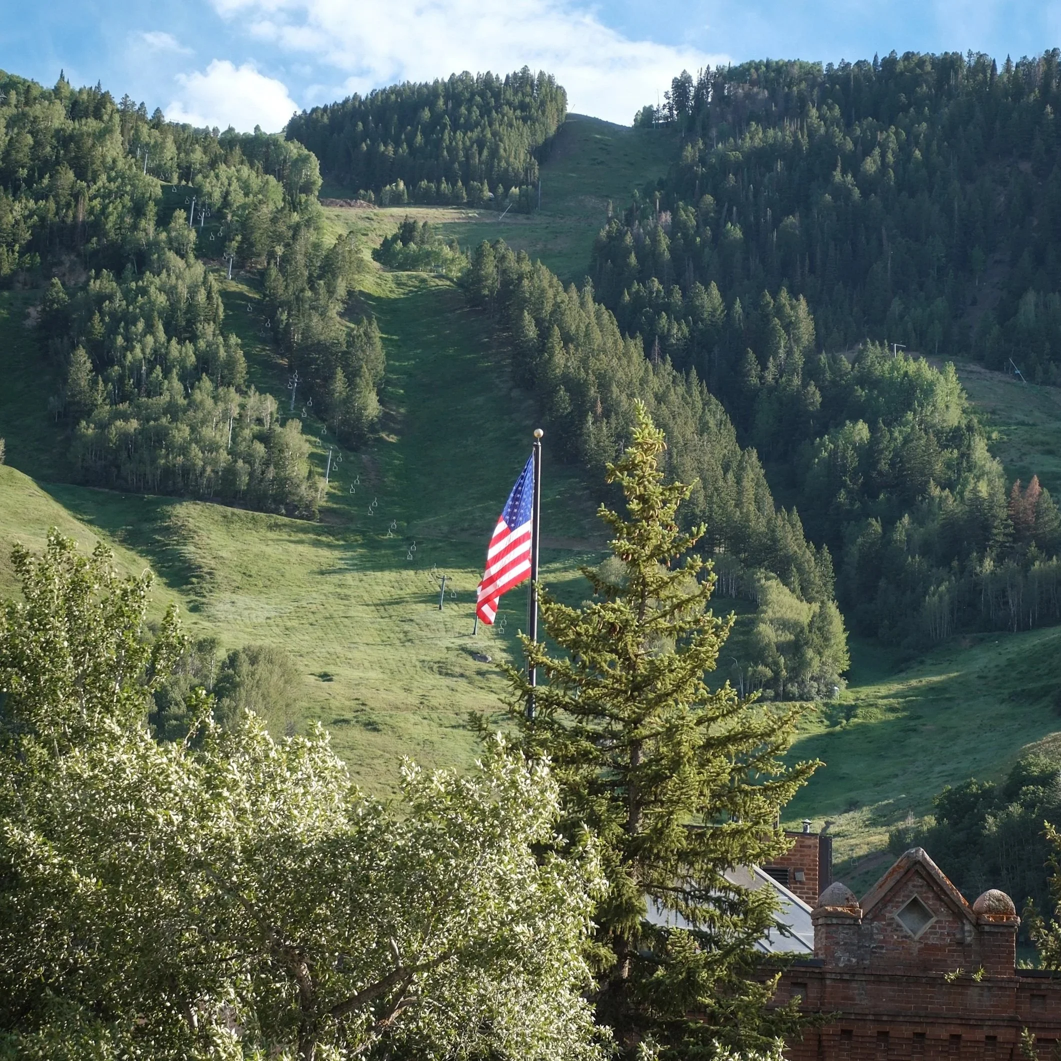 american flag on aspen mountain in summer in colorado