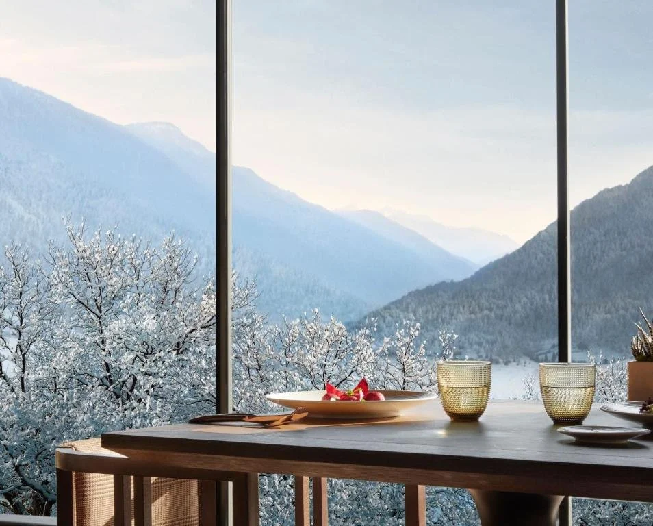 dining area overlooking dolomites at lefay resort and spa in italy