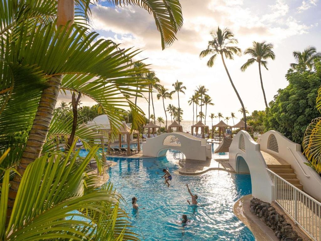 bridges and pool area at fairmont kea lani in maui hawaii