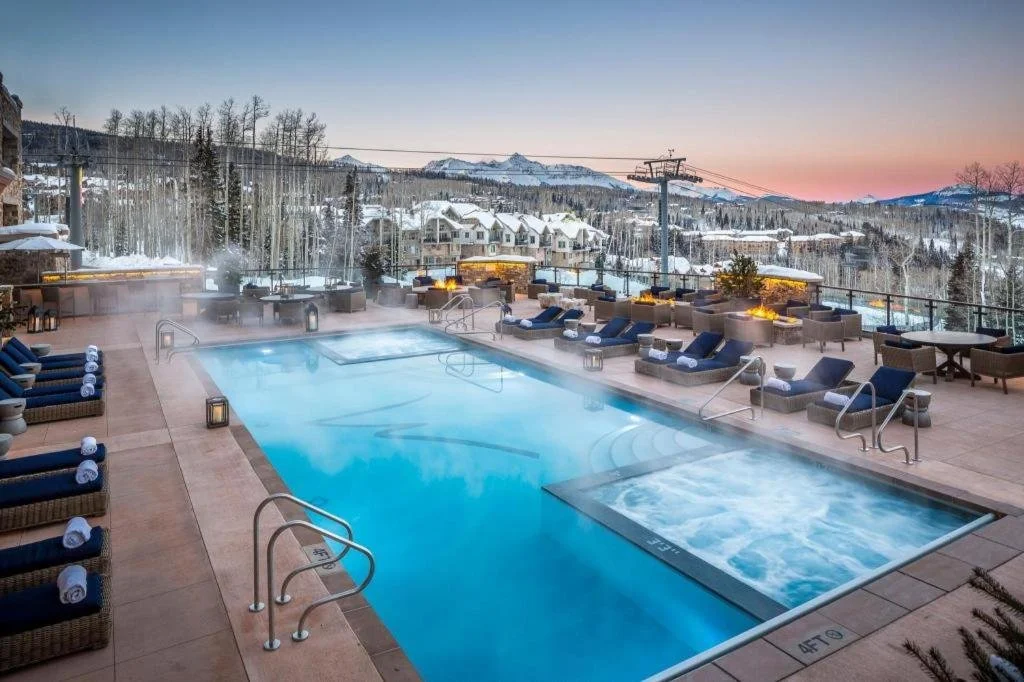 pool overlooking the ski resort at madeline hotel and residences in telluride colorado