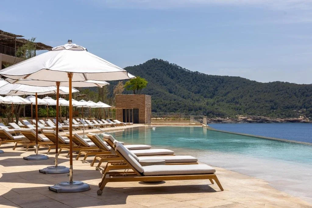infinity pool at six senses ibiza overlooking bay