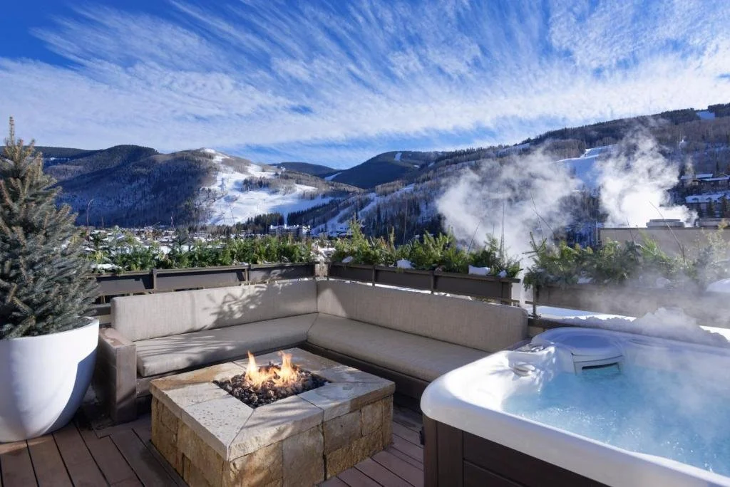 patio with private hot tub at a villa at four seasons vail in colorado
