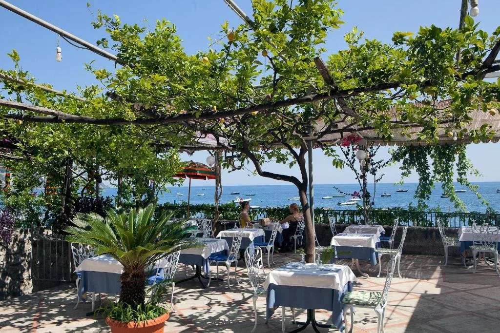 dining area overlooking the sea at hotel pupetto in positano italy